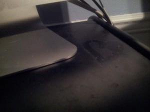 Layer of dust on my computer desk.